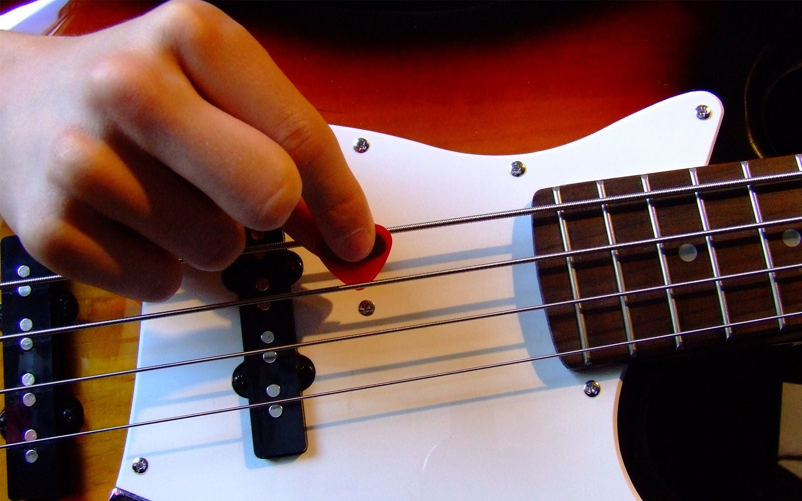 Bass Guitar With Pick or Fingers