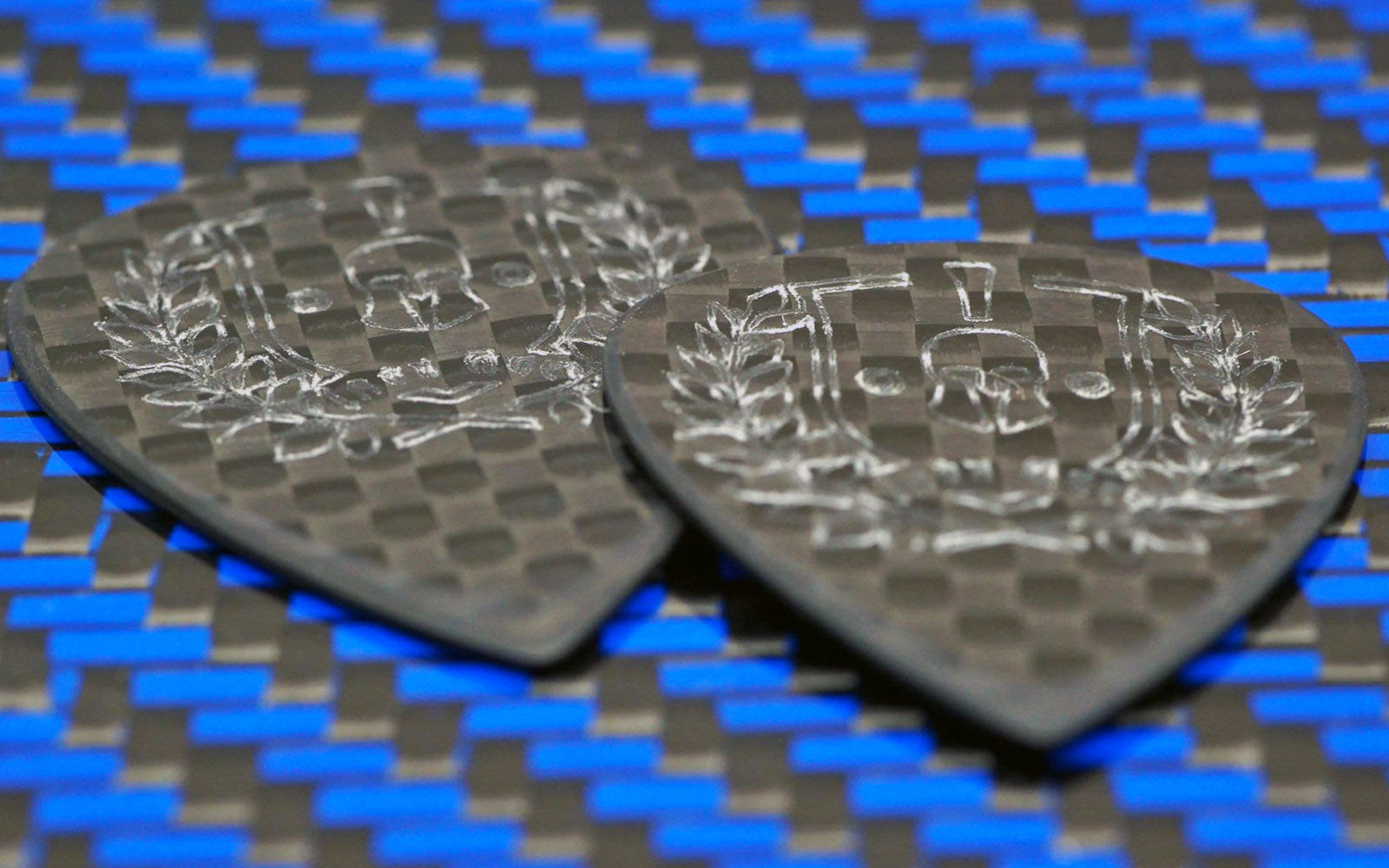 Woven carbon fiber guitar picks by Iron Age Guitar Accessories