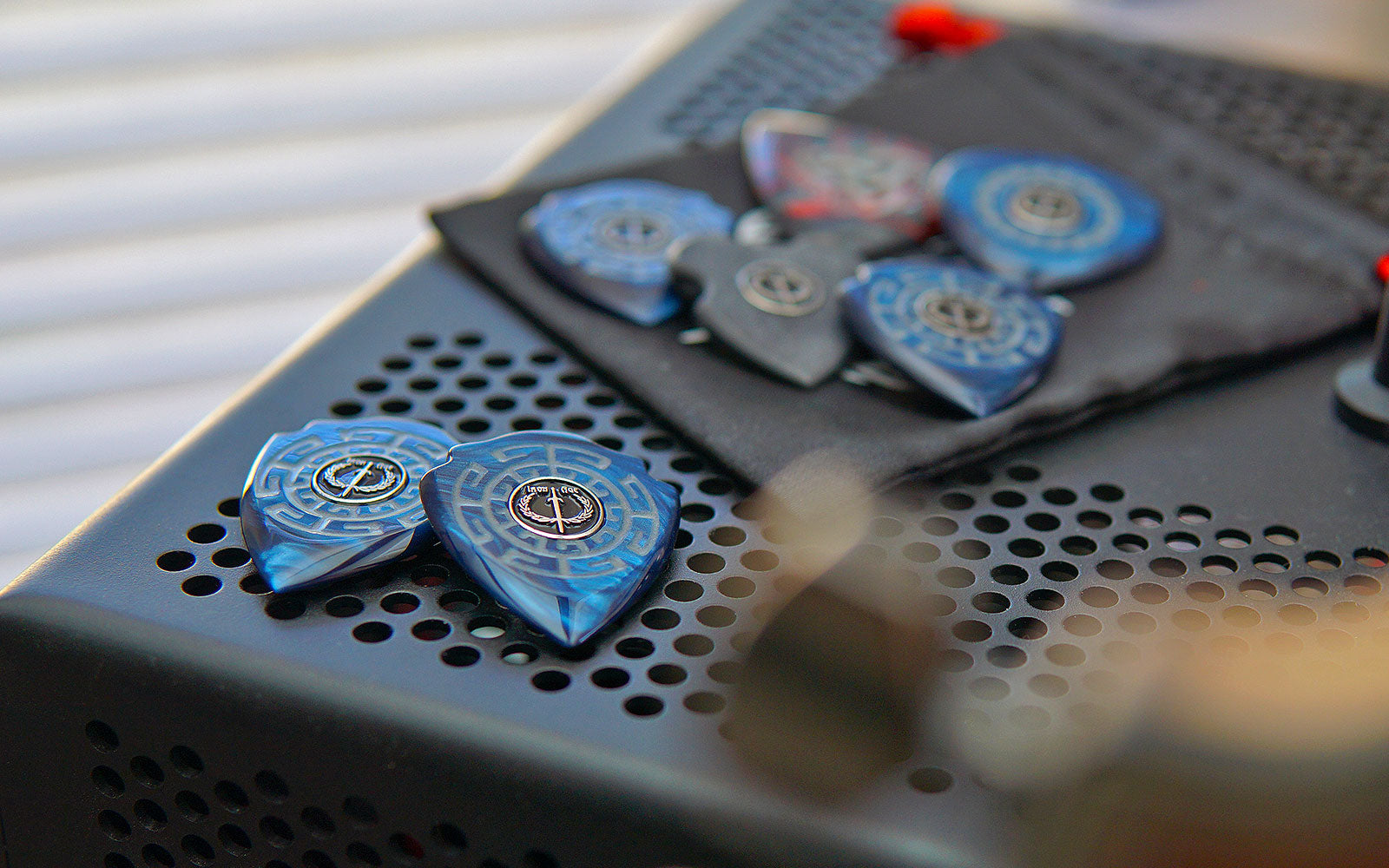 Standard shape Iron Age guitar picks with modified pointed and crown profiles