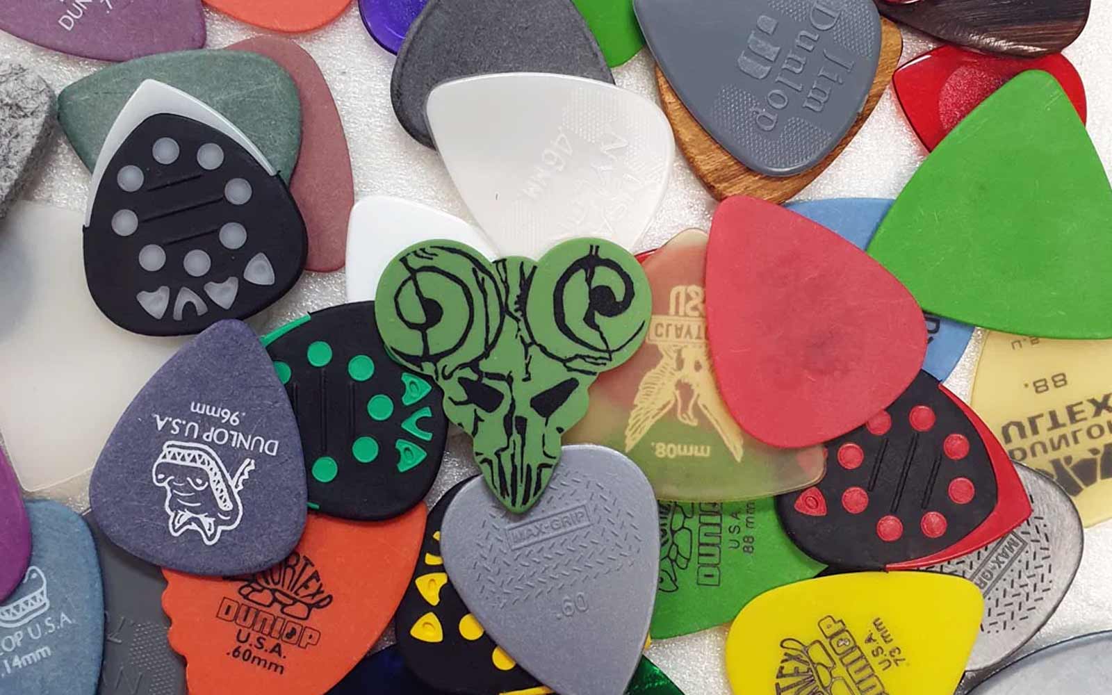 why are guitar picks different thicknesses