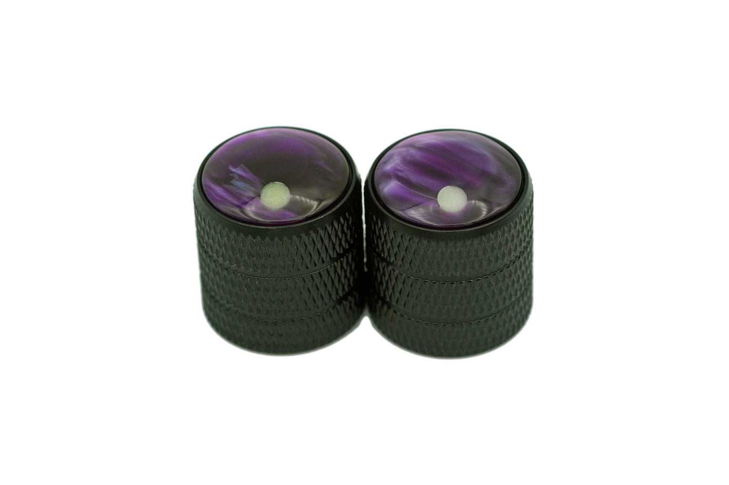 two guitar knobs with a purple pearl top & glow dot indicators