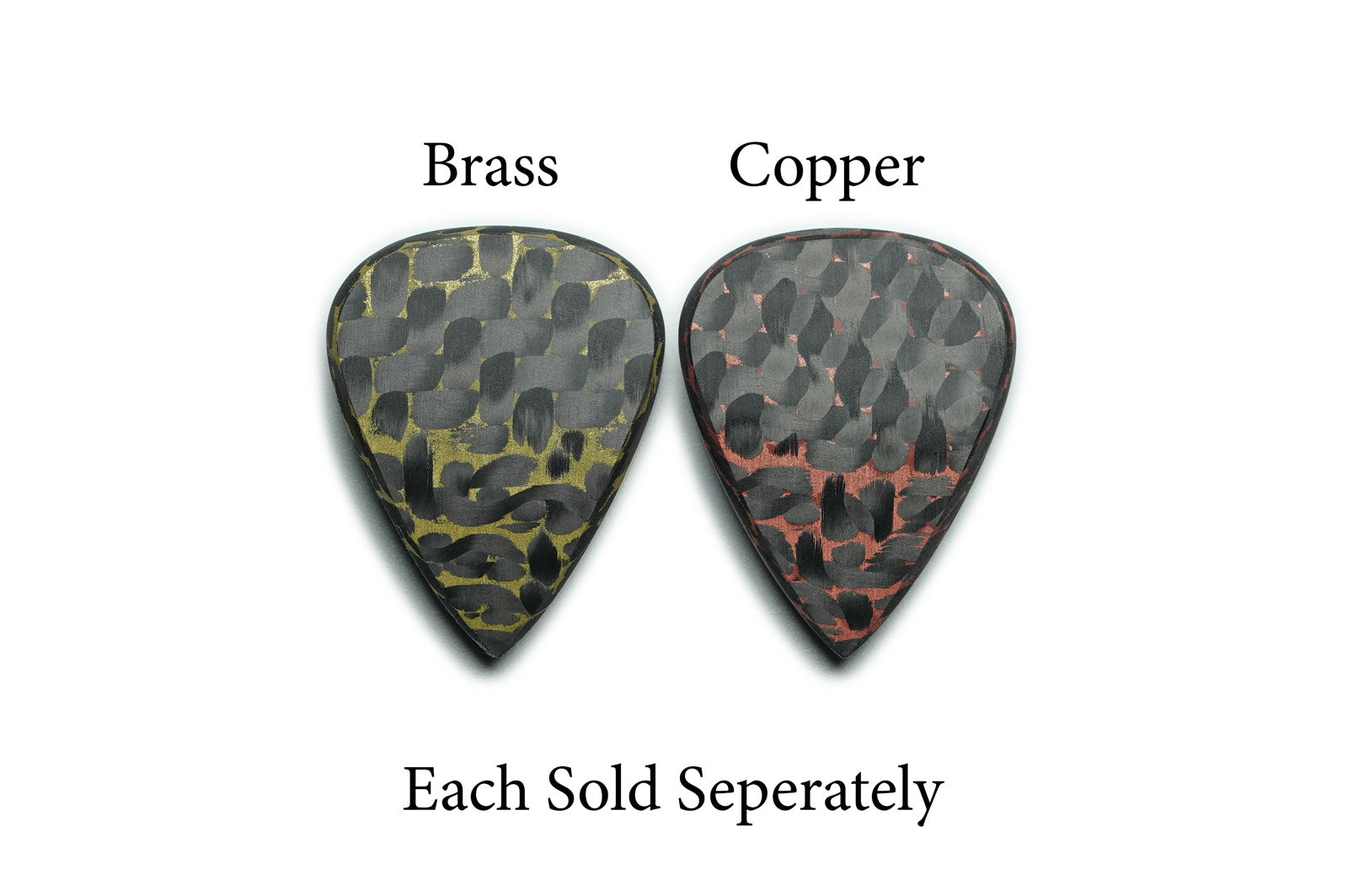 Artificer copper and brass carbon fiber guitar picks shown from the front