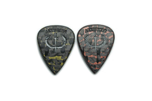 Artificer copper and brass carbon fiber guitar picks shown from the front